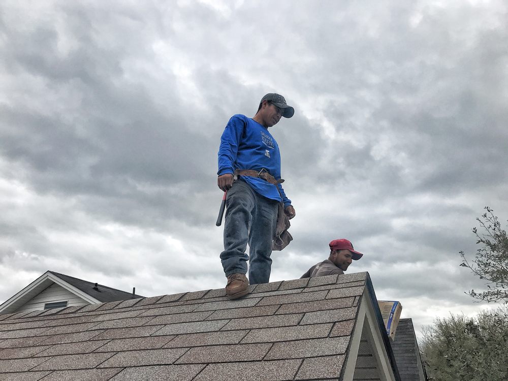 Slide of Salvador Roofing Services