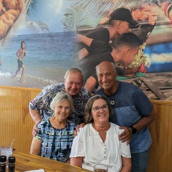 Kiwi Style Fish and Chips Anna Maria Island - Paul & Diane (L) and John & Barb enjoying fish and chips. - Fish & Chips Near Me - Holmes Beach, Florida
