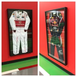 Framed in St Thomas - Custom shadow boxes for racing suits.