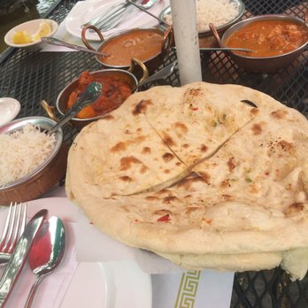 Yeti Restaurant - Garlic naan, 2 chicken tikka Marsala and chicken vindaloo - Indian Near Me - Davis, California Yeti Restaurant - Garlic naan, 2 chicken tikka Marsala and chicken vindaloo - Indian Near Me - Davis, California