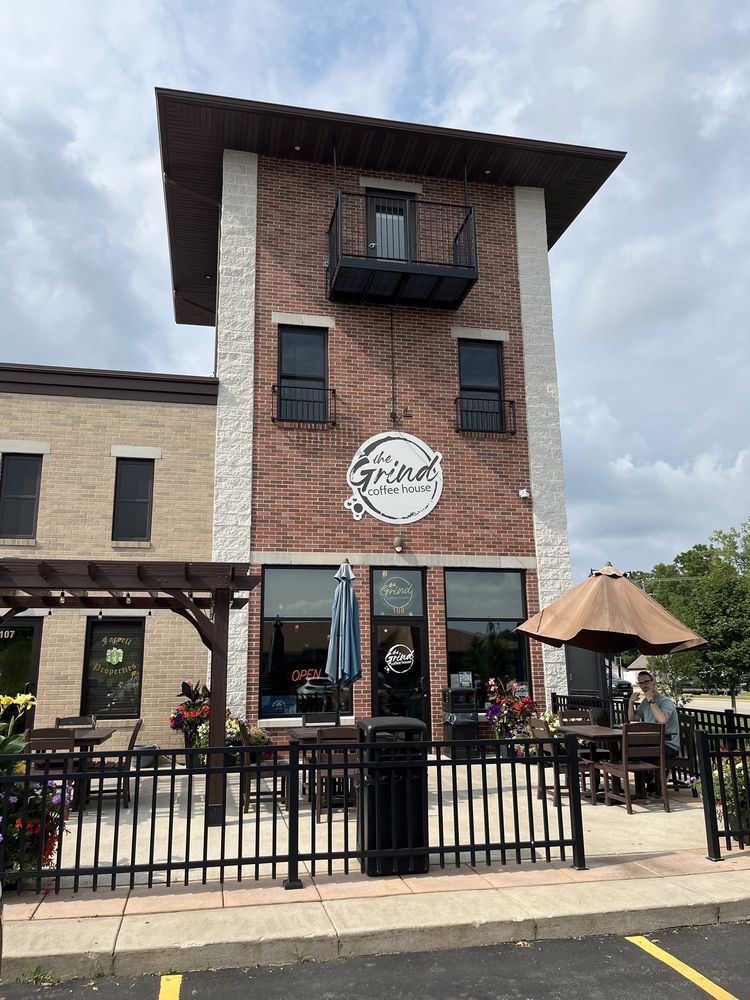 The Grind Coffee House Logo