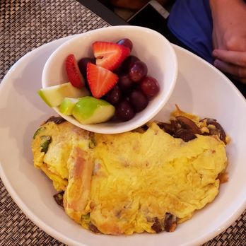 Orenda Cafe - Pollo Ahumado Picante Omelet with a side of fruit. - Breakfast & Brunch Near Me - Milwaukee, Wisconsin
