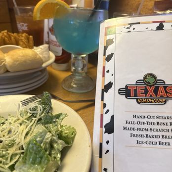 Texas Roadhouse - Drink with salad and cactus flower onion. - American Near Me - Reno, Nevada Texas Roadhouse - Drink with salad and cactus flower onion. - American Near Me - Reno, Nevada