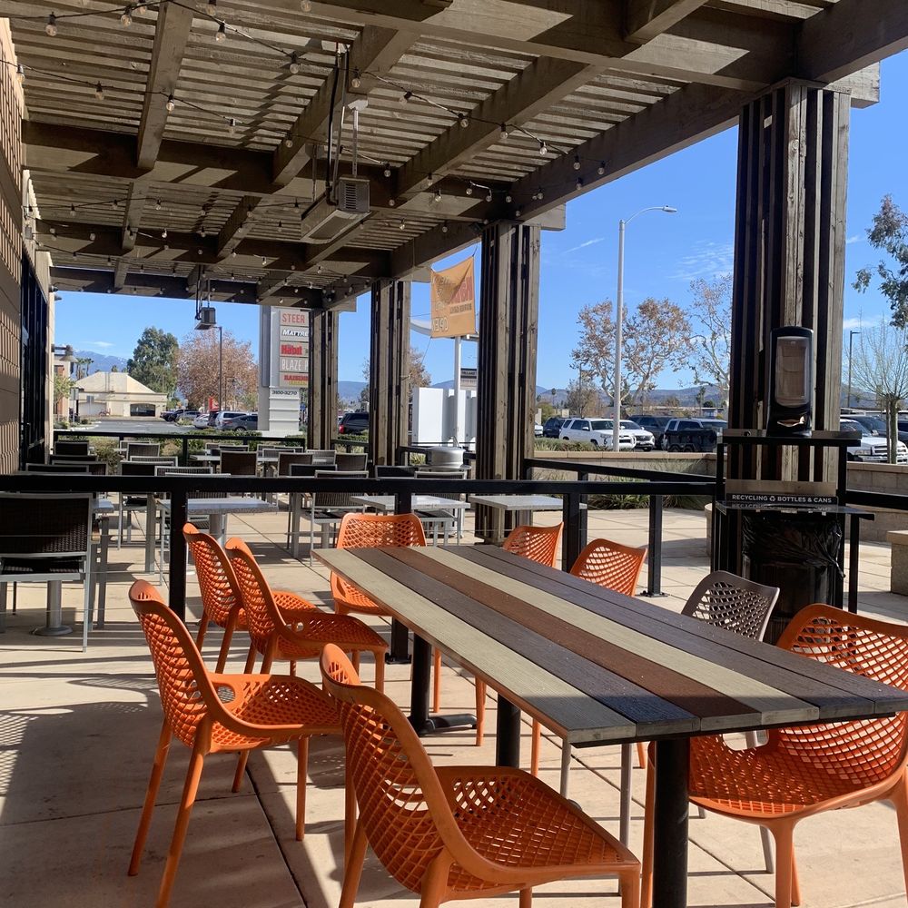 Blaze Pizza - tables and chairs in a patio area - Salad Near Me - Hemet, California