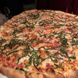Cheese pizza with extra basil