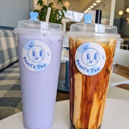 Taro milk latte and brown sugar boba milk tea. Taro milk latte and brown sugar boba milk tea.