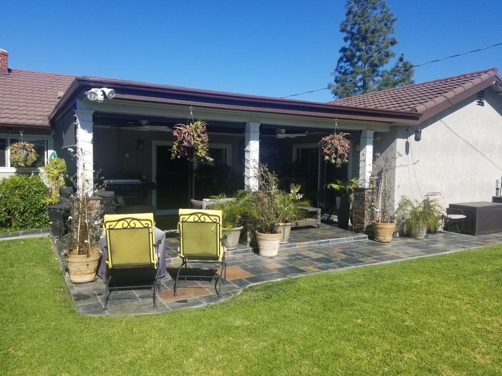 Slide of Rudy’s roofing