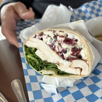 Reno's On The Runway - One half of the YKM Turkey Wrap. Substituted chicken, delightful. - Soup Near Me - Yakima, Washington Reno's On The Runway - One half of the YKM Turkey Wrap. Substituted chicken, delightful. - Soup Near Me - Yakima, Washington