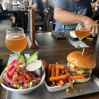 Fatpour Tap Works McCormick - Delicious burger with a crabcake and avocado on it. Yummy! Side salad & waffle fries...u better not leave hungry or it's your own fault! - Pizza Near Me - Chicago, Illinois