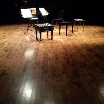 Constellation - a piano and piano stand in a dark room - Jazz & Blues Near Me - Chicago, Illinois