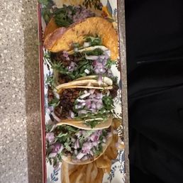Two quesabarria and three adoba tacos Two quesabarria and three adoba tacos