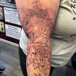 Devine Line Tattoos & Body Piercings