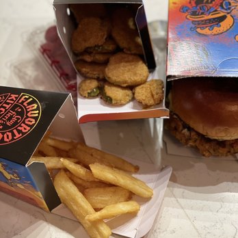 Guy Fieri's Flavortown Kitchen - Fries, pickles, veggie burger - Food Delivery Services Near Me Guy Fieri's Flavortown Kitchen - Fries, pickles, veggie burger - Food Delivery Services Near Me