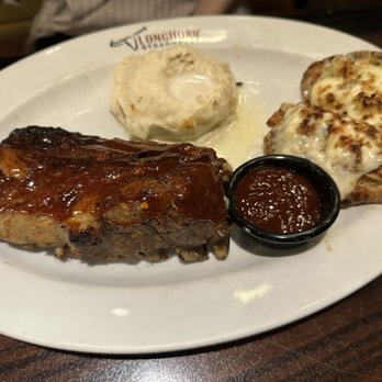 LongHorn Steakhouse - 9oz. Parmesan Crusted Chicken with Half-Rack Baby Back Ribs and Mashed Potatoes - Steakhouses Near Me - Gainesville, Florida LongHorn Steakhouse - 9oz. Parmesan Crusted Chicken with Half-Rack Baby Back Ribs and Mashed Potatoes - Steakhouses Near Me - Gainesville, Florida
