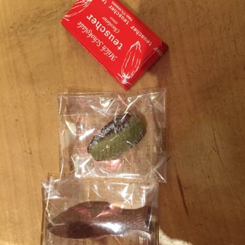 Teuscher Chocolate - Your essentials: milk chocolate bar, milk chocolate fish and a date stuffed with marzipan sprinkled with sugar. - Chocolatiers & Shops Near Me - San Francisco, California Teuscher Chocolate - Your essentials: milk chocolate bar, milk chocolate fish and a date stuffed with marzipan sprinkled with sugar. - Chocolatiers & Shops Near Me - San Francisco, California