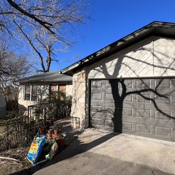 East Austin Carpenters - a house with a garage door - General Contractors Near Me - Austin, Texas East Austin Carpenters - a house with a garage door - General Contractors Near Me - Austin, Texas