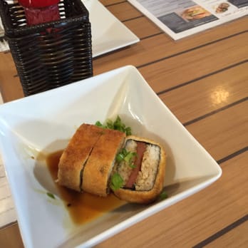 Da Kitchen Maui - Fried spam musubi. I couldn't resist eating a piece before taking the picture. - Hawaiian Near Me - Kihei, Hawaii Da Kitchen Maui - Fried spam musubi. I couldn't resist eating a piece before taking the picture. - Hawaiian Near Me - Kihei, Hawaii