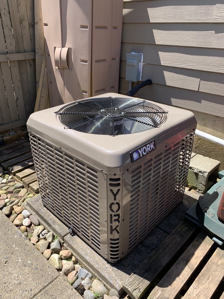 Slide of Service Tech Plumbing Heating &Cooling