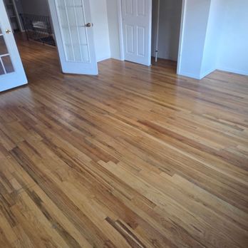 Defender Flooring - The front bedroom before - Flooring Near Me