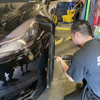 Vinh's Complete Auto Repair - Spacer install on Tesla Model 3 - Auto Repair Near Me - Garden Grove, California Vinh's Complete Auto Repair - Spacer install on Tesla Model 3 - Auto Repair Near Me - Garden Grove, California