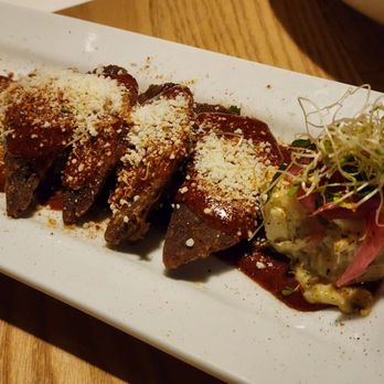 Travieso - Birria and masa dumplings. Winner at 2023 MKE Dumpling Fest - New American Near Me - Waukesha, Wisconsin Travieso - Birria and masa dumplings. Winner at 2023 MKE Dumpling Fest - New American Near Me - Waukesha, Wisconsin