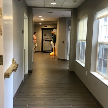 Residence Inn By Marriott - Hallway to the front lobby (Puddles welcomes you to Eugene) - Hotels Near Me - Eugene, Oregon Residence Inn By Marriott - Hallway to the front lobby (Puddles welcomes you to Eugene) - Hotels Near Me - Eugene, Oregon