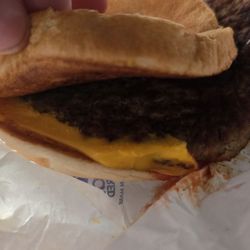 McDonald's - Surprise! They put the cheese on it!