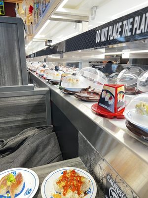 Kura Revolving Sushi Bar by null