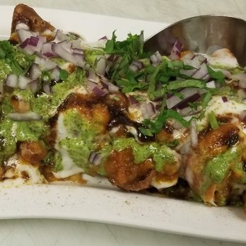 Delhi Express - a plate of food with a spoon - Indian Near Me - Chestermere, Alberta Delhi Express - a plate of food with a spoon - Indian Near Me - Chestermere, Alberta