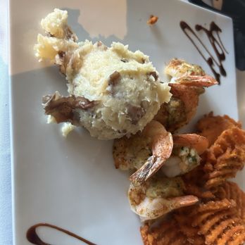 The Harbour Grille - Crab Stuffed Shrimp, mashed potatoes and sweet potato fries. - New American Near Me - Woodbridge, Virginia The Harbour Grille - Crab Stuffed Shrimp, mashed potatoes and sweet potato fries. - New American Near Me - Woodbridge, Virginia