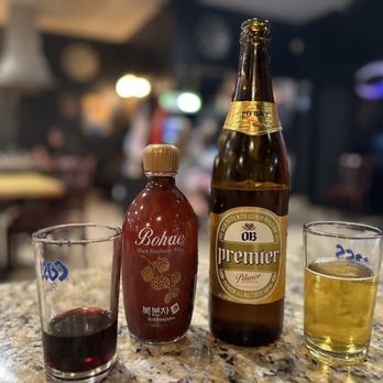 DPoong Korean BBQ - a bottle of beer and a glass of beer - Korean Near Me - Temecula, California DPoong Korean BBQ - a bottle of beer and a glass of beer - Korean Near Me - Temecula, California
