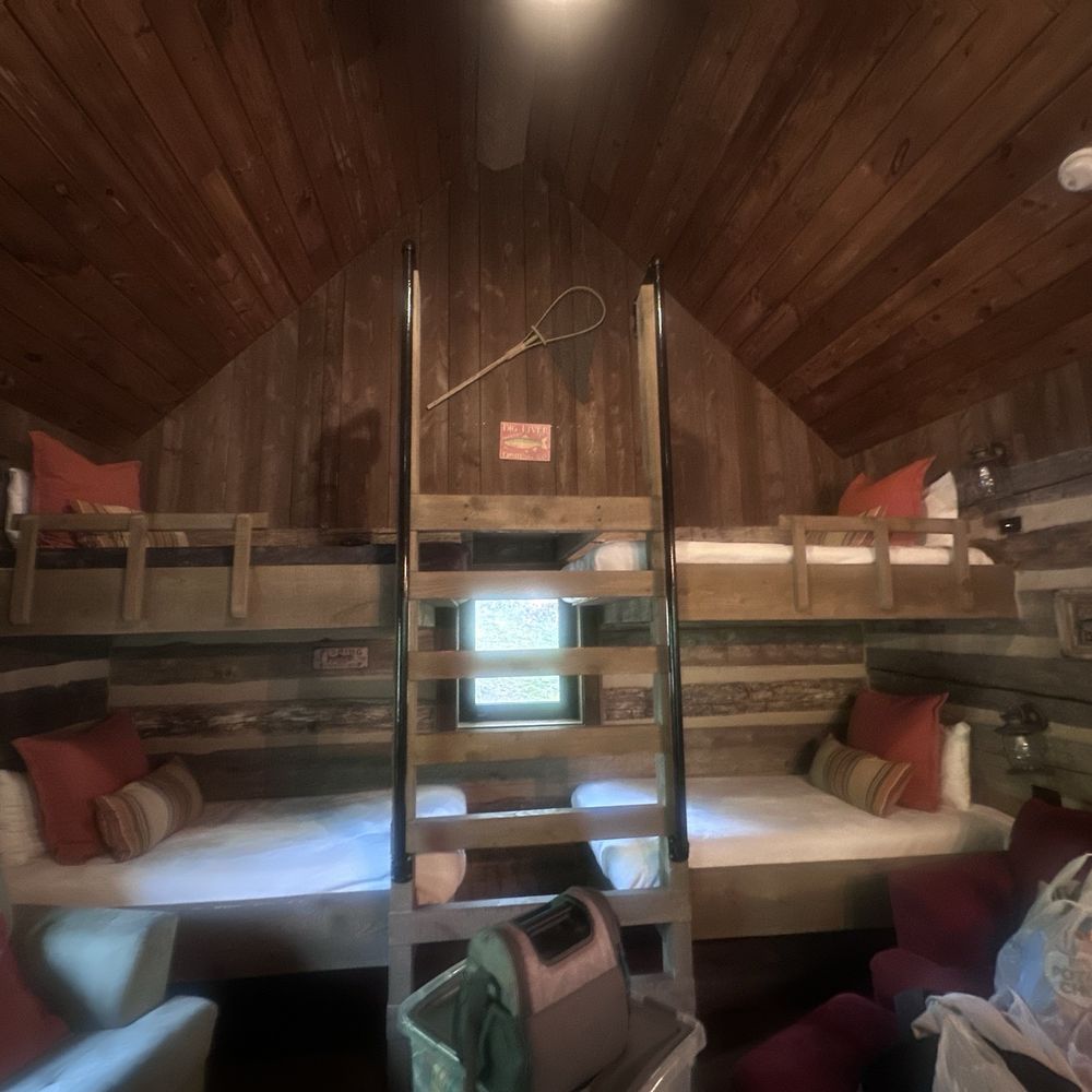 Four Fillies Lodge - Twin size bunkbeds on one wall on the opposite wall and a loft a full-size bed - Hotels Near Me - Peterstown, West Virginia