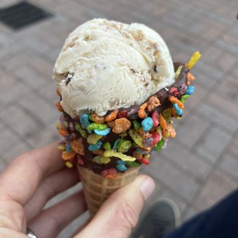 Cream - a hand holding an ice cream cone with sprinkles - Desserts Near Me - Cupertino, California Cream - a hand holding an ice cream cone with sprinkles - Desserts Near Me - Cupertino, California
