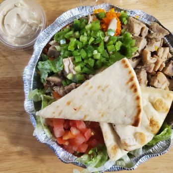 The Halal Guys - Chicken Platter with Tzatziki sauce on side. My side of hummus was missing. - Halal Near Me - Cerritos, California