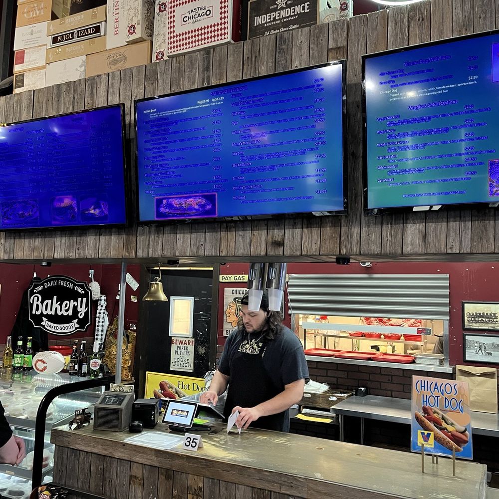 Wiseguys A Chicago Eatery - Round Rock - two men ordering food - Hot Dogs Near Me - Round Rock, Texas