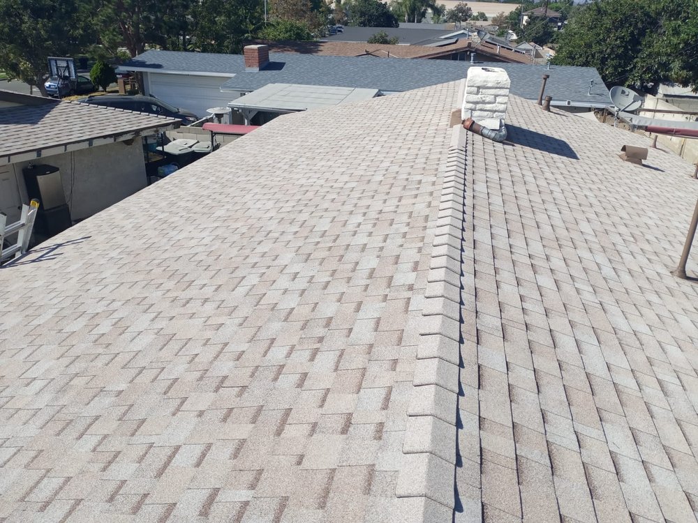 Slide of All American Construction and Roofing