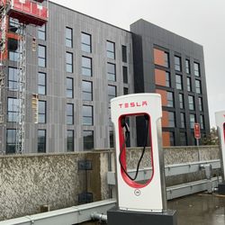 Tesla Supercharger - The adjacent building is nearly completed since the last Yelper's photo was taken