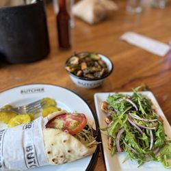 Cochon Butcher - Moroccan spiced lamp Salmon belly Brussels sprouts
