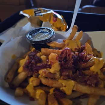 Emagine - I got a side of ranch dressing with the loaded bacon and cheese fries - Cinema Near Me - Noblesville, Indiana