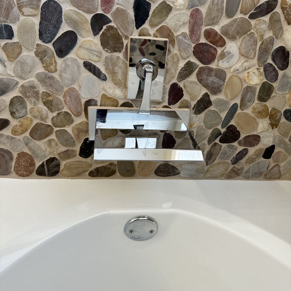 Installed waterfall faucet Installed waterfall faucet