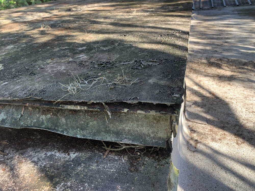 Slide of Atlantic Roofing Solutions