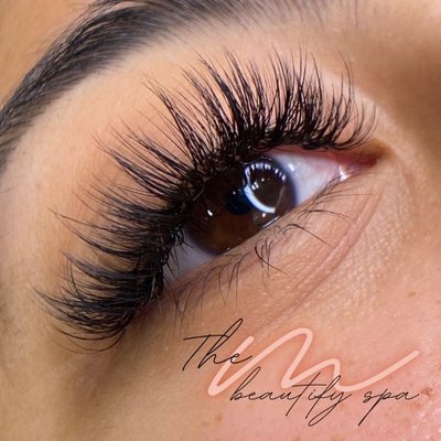 Eyelashes Extensions - Eyelash extensions are synthetic or natural fibers attached to your natural eyelashes one by one with a medical-grade adhesive to give the appearance of longer, fuller, and thicker eyelashes. The extensions come in different lengths, thicknesses, and curls, which can be customized to create various looks.