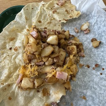beto's - You can see how little meat eggs and cheese were in this thing, and then all the potatoes. - Mexican Near Me - Kearns, Utah