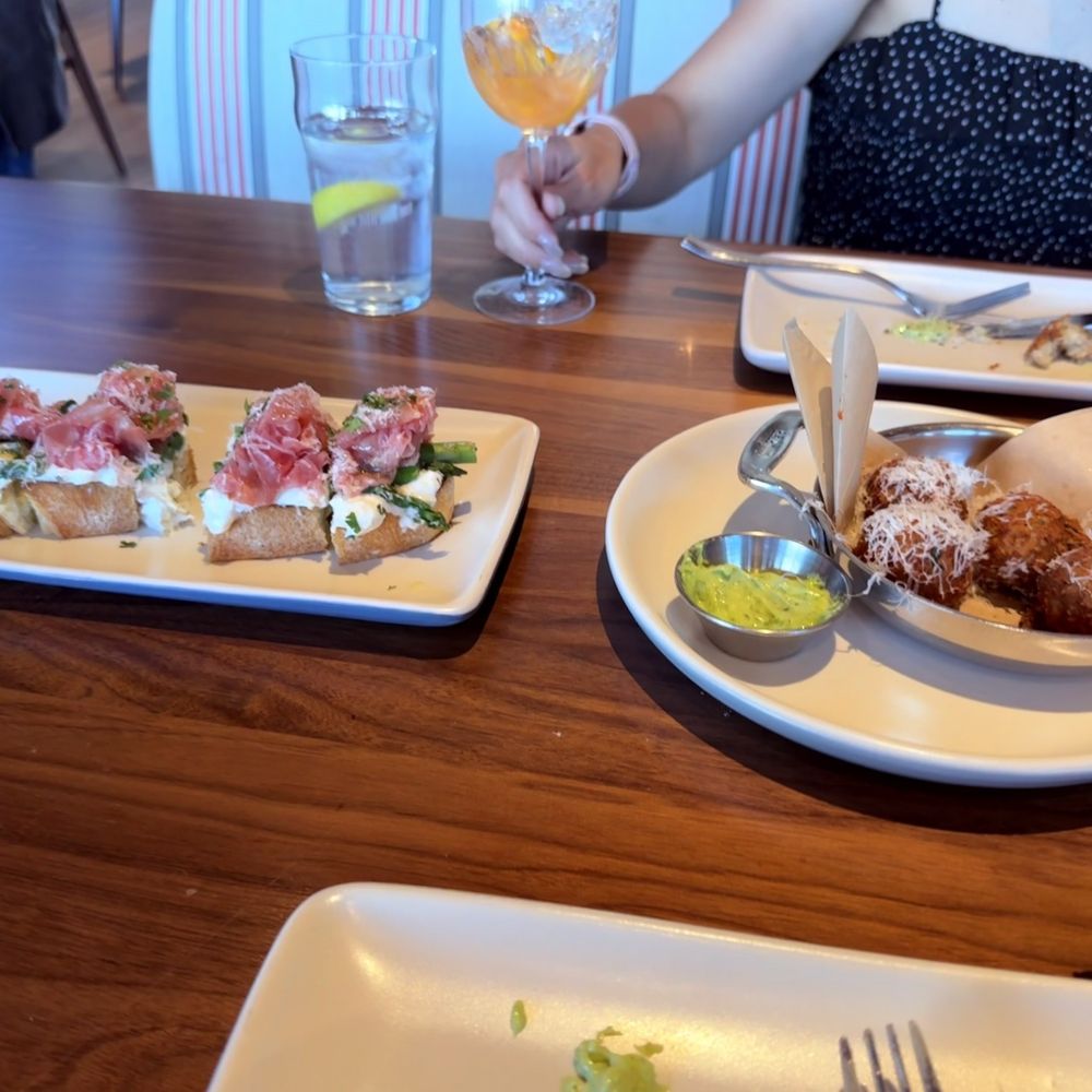 North Italia - Cacio e Pepe Arancini and Prosciutto Bruschetta - Italian Near Me - Henderson, Nevada North Italia - Cacio e Pepe Arancini and Prosciutto Bruschetta - Italian Near Me - Henderson, Nevada