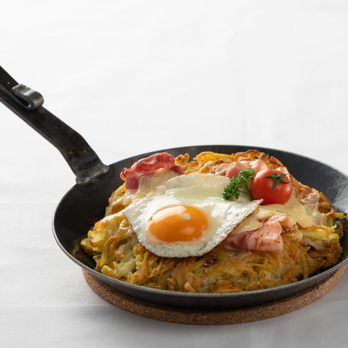Restaurant Spycher - Alp roesti (potato) with Swiss alpine bacon, mountain cheese and apple puree - Swiss Food Near Me - Interlaken, BE Restaurant Spycher - Alp roesti (potato) with Swiss alpine bacon, mountain cheese and apple puree - Swiss Food Near Me - Interlaken, BE