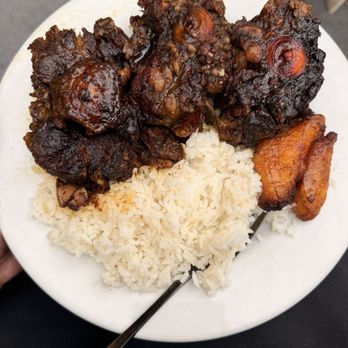 Jam N Jerk Kitchen - Oxtail over white rice and plantain - Caribbean Near Me - Pleasant Hill, California Jam N Jerk Kitchen - Oxtail over white rice and plantain - Caribbean Near Me - Pleasant Hill, California
