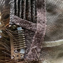 Worn combs. I had this item 4 days before calling to complain. Never worn.