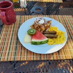 Silver Star Country Inn - Breakfast Day #2. Apple-caramel French Toast bake with sausage and eggs. Diane absolutely loved the French toast. Coffee mugs are cute.