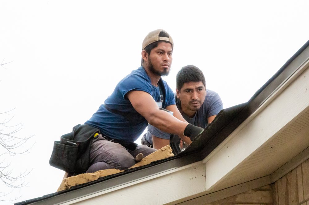 Slide of Robert Juelich Roofing