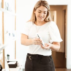 KD Aesthetics - Provider, Emily Oaks, assisting a patient with kd aesthetic's medical grade skincare.